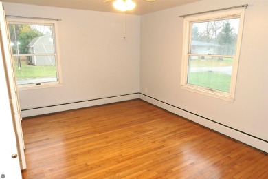 A golfer's dream! This beautiful 3-bedroom 2-bathroom home is on The Links At Edmore in Michigan - for sale on GolfHomes.com, golf home, golf lot