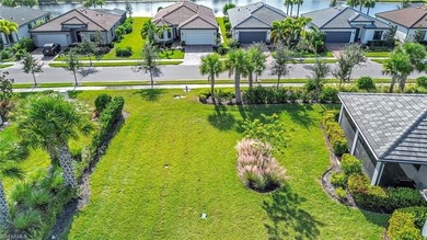 CORNER LOT - DESIGNER SELECTIONS- IMPACT GLASS- 4' GARAGE on Panther Run Golf Club in Florida - for sale on GolfHomes.com, golf home, golf lot