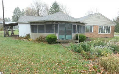 A golfer's dream! This beautiful 3-bedroom 2-bathroom home is on The Links At Edmore in Michigan - for sale on GolfHomes.com, golf home, golf lot