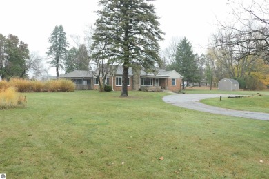 A golfer's dream! This beautiful 3-bedroom 2-bathroom home is on The Links At Edmore in Michigan - for sale on GolfHomes.com, golf home, golf lot