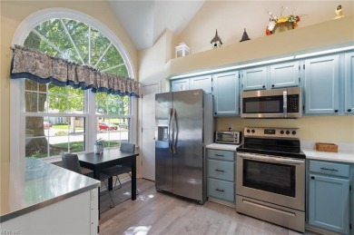 Head inside to discover an open-concept you'll love. With warm on Greenbrier Country Club in Virginia - for sale on GolfHomes.com, golf home, golf lot