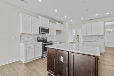 Be prepared to be WOWED with this luxury lifestyle. Premier on Sound Golf Links at Albemarle Plantation in North Carolina - for sale on GolfHomes.com, golf home, golf lot