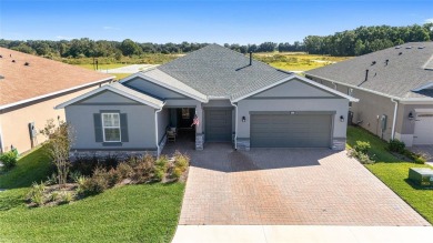 GORGEOUS ALMOST BRAND NEW 3/3/3 home in Ocala Preserve's gated on Trilogy at Ocala Preserve in Florida - for sale on GolfHomes.com, golf home, golf lot