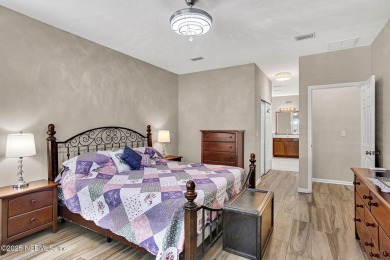 Wonderfully maintained 4 bedroom, 2 & 1/2 bathroom home situated on St. Johns Golf and Country Club in Florida - for sale on GolfHomes.com, golf home, golf lot