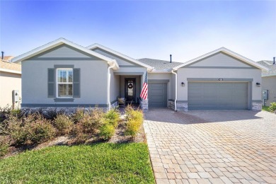 GORGEOUS ALMOST BRAND NEW 3/3/3 home in Ocala Preserve's gated on Trilogy at Ocala Preserve in Florida - for sale on GolfHomes.com, golf home, golf lot