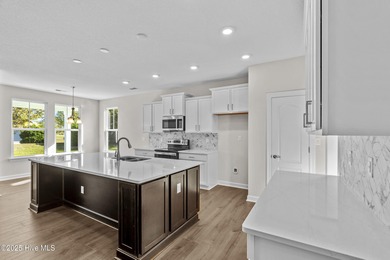 Be prepared to be WOWED with this luxury lifestyle. Premier on Sound Golf Links at Albemarle Plantation in North Carolina - for sale on GolfHomes.com, golf home, golf lot