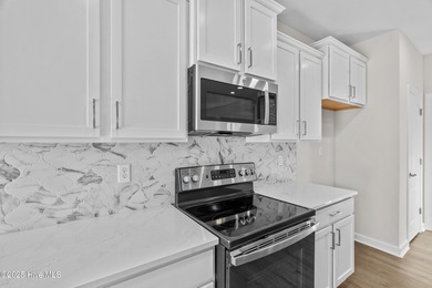 Be prepared to be WOWED with this luxury lifestyle. Premier on Sound Golf Links at Albemarle Plantation in North Carolina - for sale on GolfHomes.com, golf home, golf lot