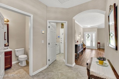 Wonderfully maintained 4 bedroom, 2 & 1/2 bathroom home situated on St. Johns Golf and Country Club in Florida - for sale on GolfHomes.com, golf home, golf lot