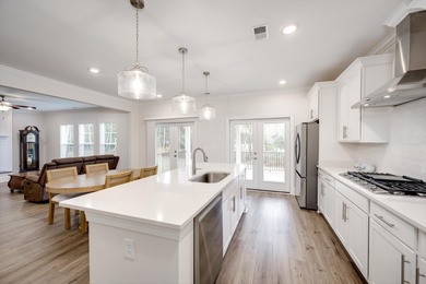 Experience timeless elegance and resort-style living in this on Mount Vintage Plantation and Golf Club  in South Carolina - for sale on GolfHomes.com, golf home, golf lot