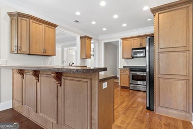 Charming 3-bedroom, 2.5-bath home located in the desirable on Harbor Club Golf and Country Club in Georgia - for sale on GolfHomes.com, golf home, golf lot