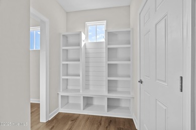 Be prepared to be WOWED with this luxury lifestyle. Premier on Sound Golf Links at Albemarle Plantation in North Carolina - for sale on GolfHomes.com, golf home, golf lot