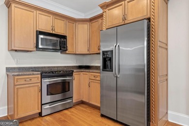 Charming 3-bedroom, 2.5-bath home located in the desirable on Harbor Club Golf and Country Club in Georgia - for sale on GolfHomes.com, golf home, golf lot