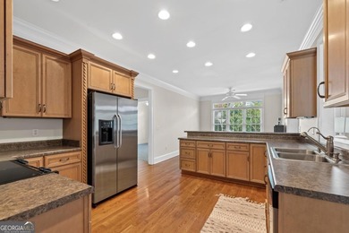 Charming 3-bedroom, 2.5-bath home located in the desirable on Harbor Club Golf and Country Club in Georgia - for sale on GolfHomes.com, golf home, golf lot