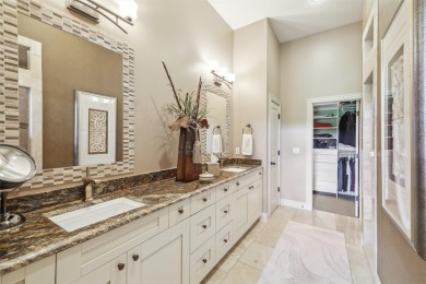 Discover refined elegance in this exceptional walkout ranch on Glen Oaks Country Club in Iowa - for sale on GolfHomes.com, golf home, golf lot