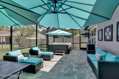 Wonderfully maintained 4 bedroom, 2 & 1/2 bathroom home situated on St. Johns Golf and Country Club in Florida - for sale on GolfHomes.com, golf home, golf lot