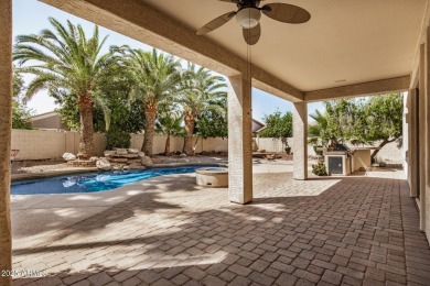 Welcome to this stunning 4-bed, 3-bath home in a gated on Palm Valley Golf Club  in Arizona - for sale on GolfHomes.com, golf home, golf lot