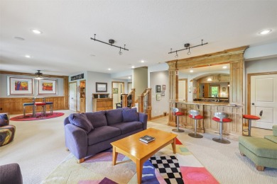 Discover refined elegance in this exceptional walkout ranch on Glen Oaks Country Club in Iowa - for sale on GolfHomes.com, golf home, golf lot