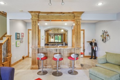 Discover refined elegance in this exceptional walkout ranch on Glen Oaks Country Club in Iowa - for sale on GolfHomes.com, golf home, golf lot