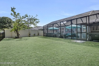 Wonderfully maintained 4 bedroom, 2 & 1/2 bathroom home situated on St. Johns Golf and Country Club in Florida - for sale on GolfHomes.com, golf home, golf lot