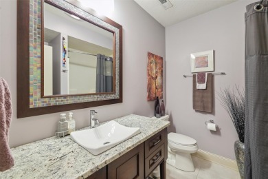 Discover refined elegance in this exceptional walkout ranch on Glen Oaks Country Club in Iowa - for sale on GolfHomes.com, golf home, golf lot