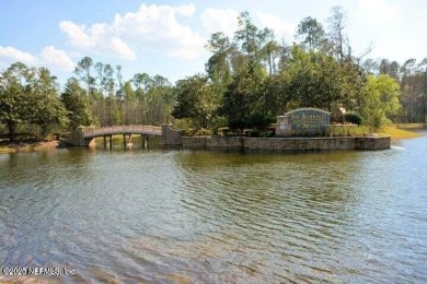 Wonderfully maintained 4 bedroom, 2 & 1/2 bathroom home situated on St. Johns Golf and Country Club in Florida - for sale on GolfHomes.com, golf home, golf lot