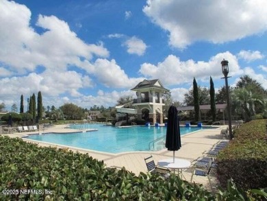 Wonderfully maintained 4 bedroom, 2 & 1/2 bathroom home situated on St. Johns Golf and Country Club in Florida - for sale on GolfHomes.com, golf home, golf lot