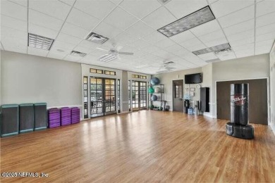 Wonderfully maintained 4 bedroom, 2 & 1/2 bathroom home situated on St. Johns Golf and Country Club in Florida - for sale on GolfHomes.com, golf home, golf lot