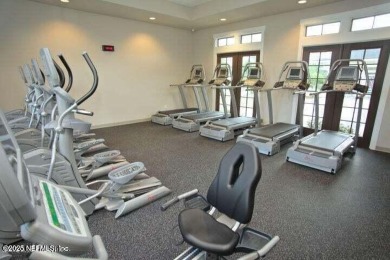 Wonderfully maintained 4 bedroom, 2 & 1/2 bathroom home situated on St. Johns Golf and Country Club in Florida - for sale on GolfHomes.com, golf home, golf lot