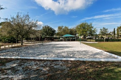 Wonderfully maintained 4 bedroom, 2 & 1/2 bathroom home situated on St. Johns Golf and Country Club in Florida - for sale on GolfHomes.com, golf home, golf lot