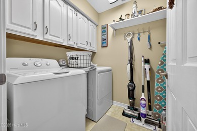 Discover easy, low-maintenance coastal living in this stunning on Brick Landing Plantation Yacht and Golf Club in North Carolina - for sale on GolfHomes.com, golf home, golf lot