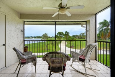 Wake up to stunning lake, golf course, and country club views in on Eastpointe Country Club in Florida - for sale on GolfHomes.com, golf home, golf lot