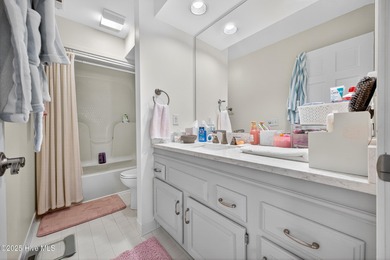 Discover easy, low-maintenance coastal living in this stunning on Brick Landing Plantation Yacht and Golf Club in North Carolina - for sale on GolfHomes.com, golf home, golf lot