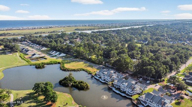 Discover easy, low-maintenance coastal living in this stunning on Brick Landing Plantation Yacht and Golf Club in North Carolina - for sale on GolfHomes.com, golf home, golf lot