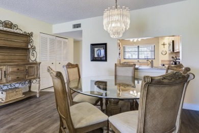 Wake up to stunning lake, golf course, and country club views in on Eastpointe Country Club in Florida - for sale on GolfHomes.com, golf home, golf lot