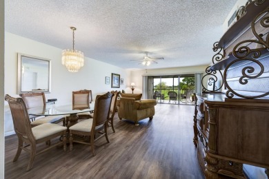 Wake up to stunning lake, golf course, and country club views in on Eastpointe Country Club in Florida - for sale on GolfHomes.com, golf home, golf lot