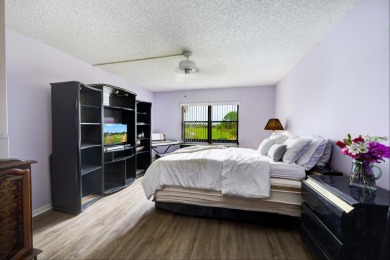 Wake up to stunning lake, golf course, and country club views in on Eastpointe Country Club in Florida - for sale on GolfHomes.com, golf home, golf lot