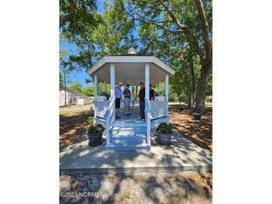 Discover easy, low-maintenance coastal living in this stunning on Brick Landing Plantation Yacht and Golf Club in North Carolina - for sale on GolfHomes.com, golf home, golf lot