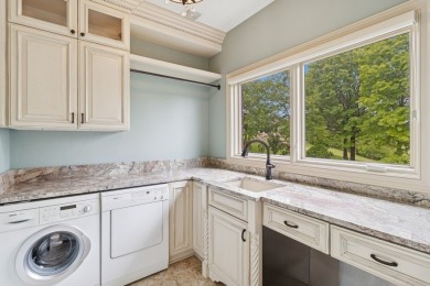 Welcome to luxury living in this stunning 4-bedroom, brick on Glen Oaks Country Club in Iowa - for sale on GolfHomes.com, golf home, golf lot