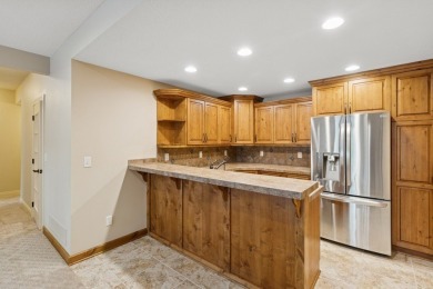 Welcome to luxury living in this stunning 4-bedroom, brick on Glen Oaks Country Club in Iowa - for sale on GolfHomes.com, golf home, golf lot