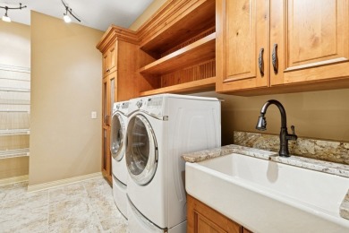 Welcome to luxury living in this stunning 4-bedroom, brick on Glen Oaks Country Club in Iowa - for sale on GolfHomes.com, golf home, golf lot