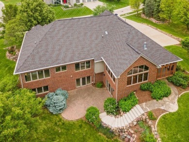 Welcome to luxury living in this stunning 4-bedroom, brick on Glen Oaks Country Club in Iowa - for sale on GolfHomes.com, golf home, golf lot