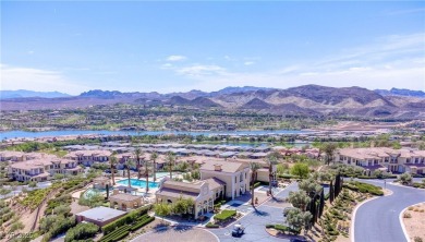 Nestled on Reflection Bay Golf Course and offering three on Reflection Bay Golf Club in Nevada - for sale on GolfHomes.com, golf home, golf lot