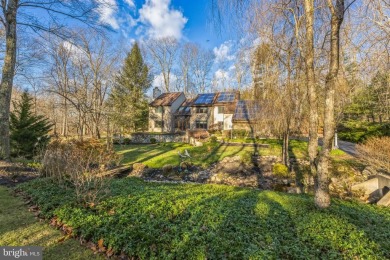 This stunning contemporary residence is the epitome of modern on Radley Run Country Club in Pennsylvania - for sale on GolfHomes.com, golf home, golf lot