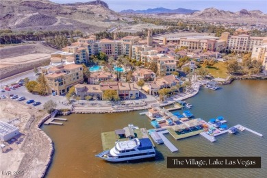 Nestled on Reflection Bay Golf Course and offering three on Reflection Bay Golf Club in Nevada - for sale on GolfHomes.com, golf home, golf lot