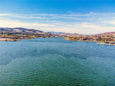 Nestled on Reflection Bay Golf Course and offering three on Reflection Bay Golf Club in Nevada - for sale on GolfHomes.com, golf home, golf lot