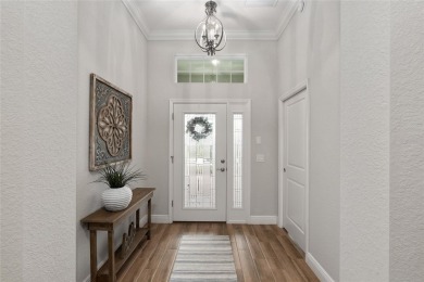 This stunning Flamingo Model home, built in 2021 is situated in on Miona Lake Golf Club in Florida - for sale on GolfHomes.com, golf home, golf lot