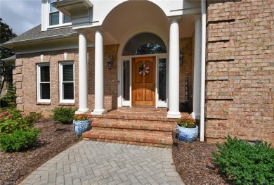 Welcome to this stunning, custom built, all brick home, backing on Grandover Resort in North Carolina - for sale on GolfHomes.com, golf home, golf lot