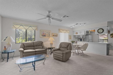 Welcome to 7535 Greystone Drive - a beautifully maintained END on Beacon Woods Golf Club in Florida - for sale on GolfHomes.com, golf home, golf lot