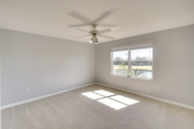 Enjoy stunning lake and golf course views from this lovely on Terra Ceia Golf and Country Club in Florida - for sale on GolfHomes.com, golf home, golf lot