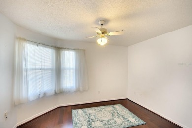 Enjoy stunning lake and golf course views from this lovely on Terra Ceia Golf and Country Club in Florida - for sale on GolfHomes.com, golf home, golf lot